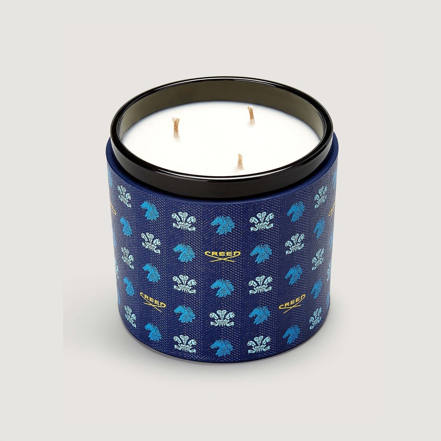 Bougie Vanisia dans son étui en cuir bleu CREED - Parfumerie du Soleil d'Or