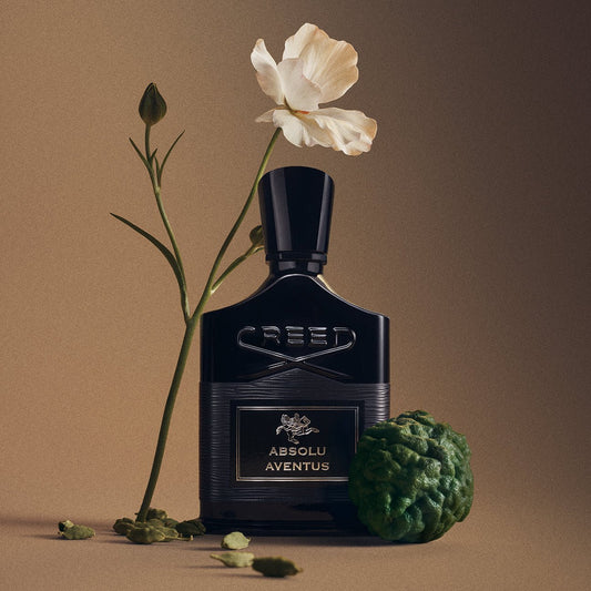 Absolu Aventus by Creed, bottle with raw materials